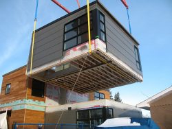 Modular home being placed